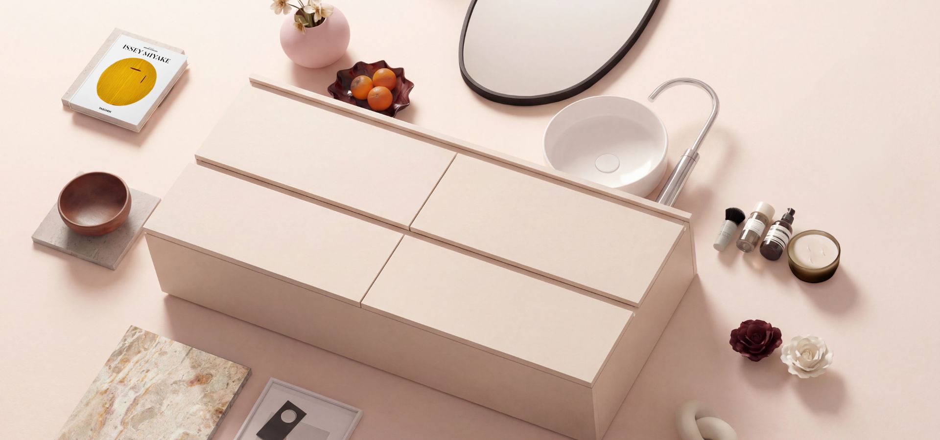 Meuble de salle de bain rose avec vasque et poignées intégrées