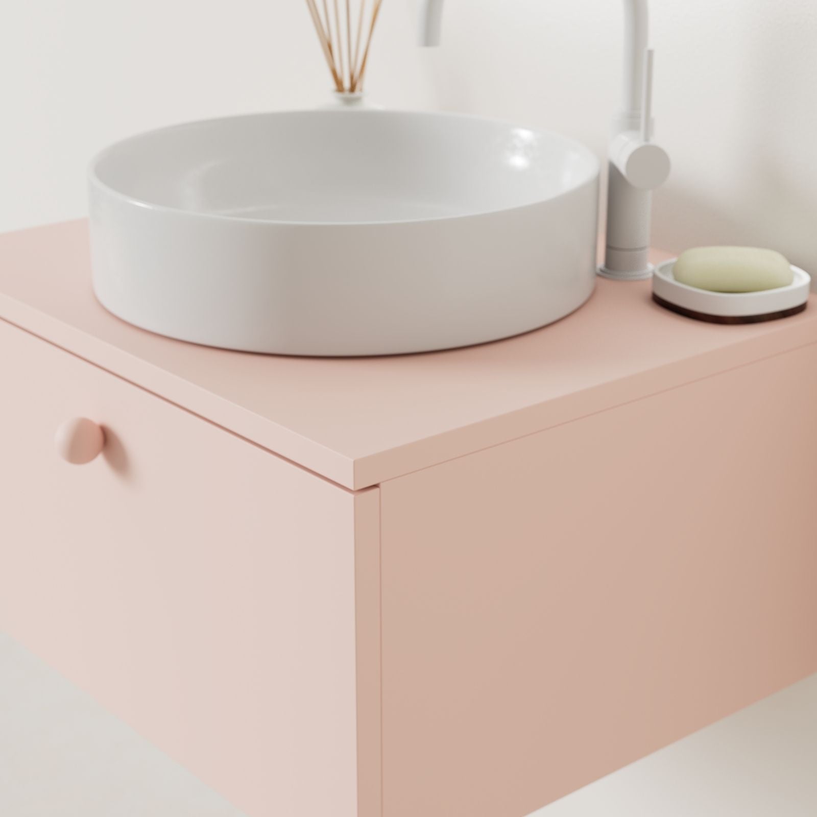 meuble salle de bain mino 60 cm rose avec vasque posé vue angle