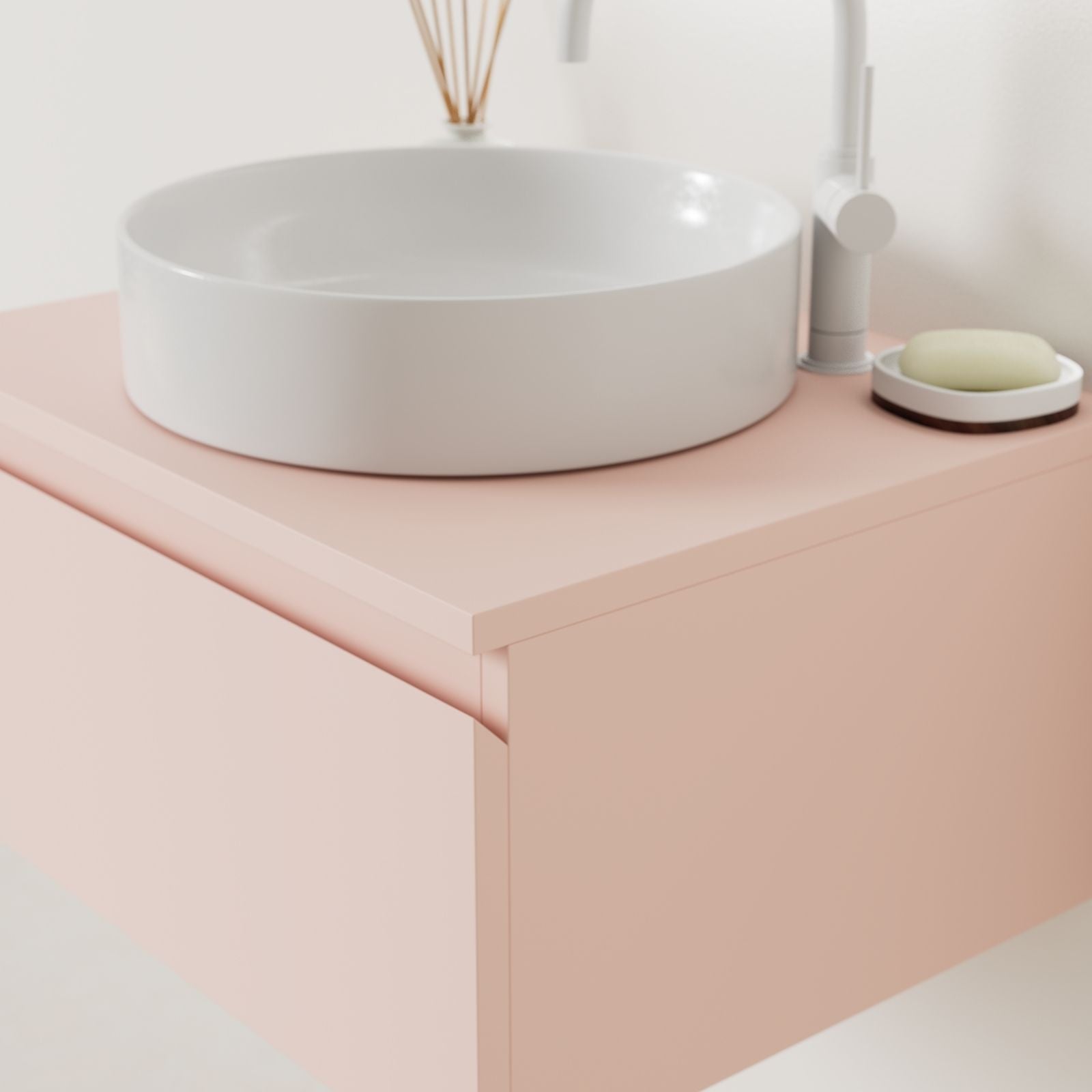 meuble salle de bain mino 60 cm rose poignées intégrées avec vasque posé vue angle