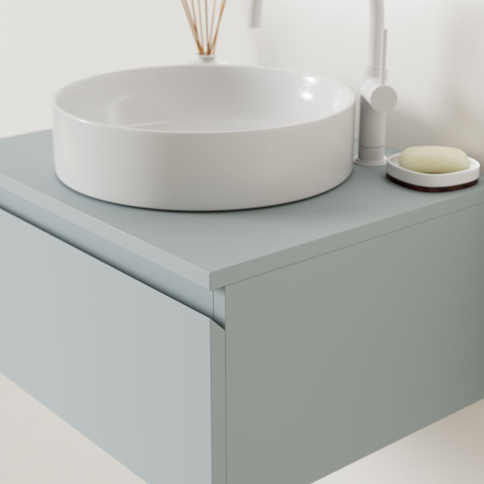 meuble salle de bain mino 60 cm bleu poignées intégrées avec vasque posé vue angle